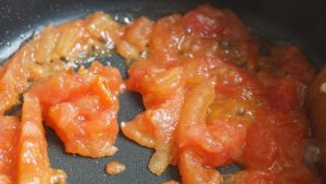 Tomatoes: Score a small "X" on the bottom of the tomato. Blanch in boiling water for 30 seconds, then peel the skin off. Dice the flesh.