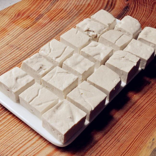 Prep the Tofu: Rinse the tofu block gently under cold water.