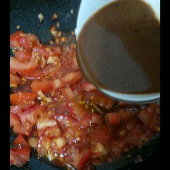 Simmer the Sauce Pour in the pre-mixed bowl of sauce.