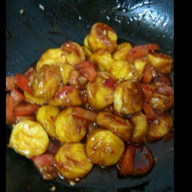 Combine Once the sauce is bubbling and thickened, gently slide the fried tofu back into the pan.