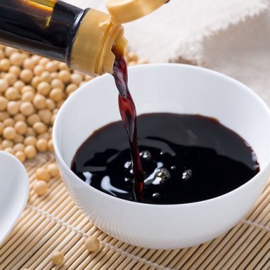 Pouring dark soy sauce texture