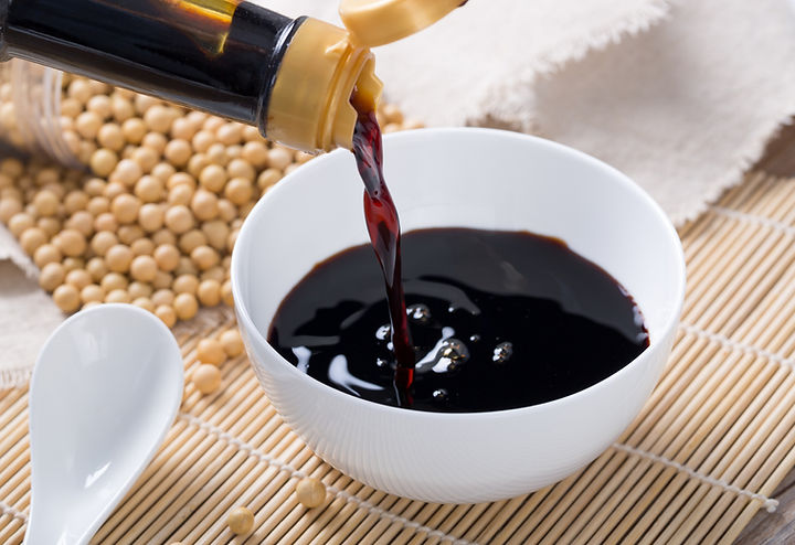 Pouring dark soy sauce texture