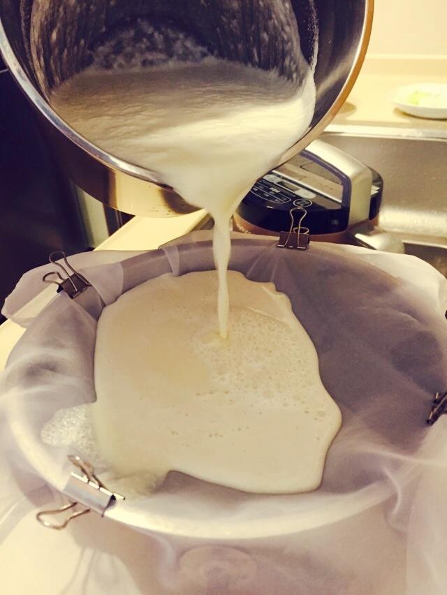 Pour the blended mixture through a fine mesh nut milk bag or cheesecloth into a large bowl.
