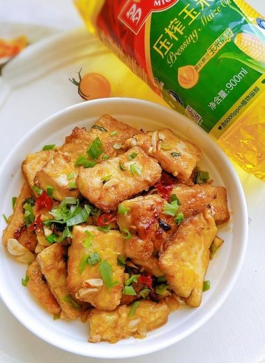 Crispy pan-fried tofu with garlic soy glaze, golden and glossy