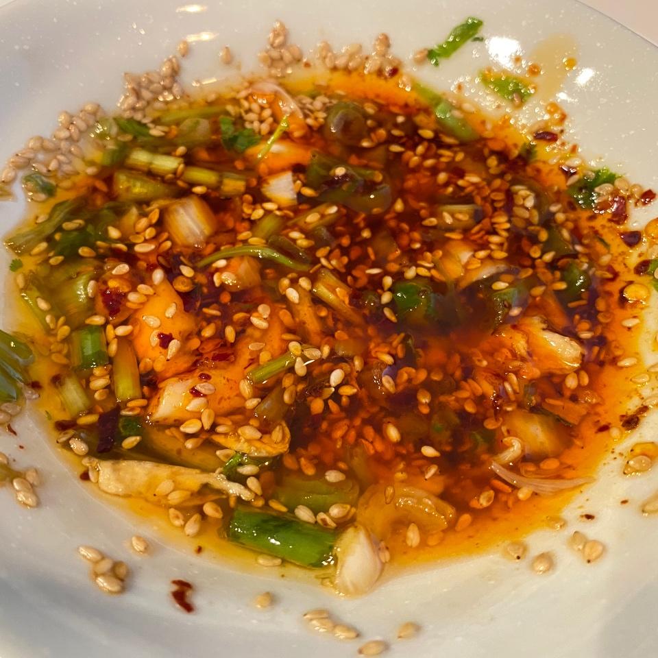 Add the soy, vinegar, chili paste, and sugar;