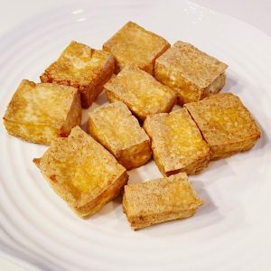 The tofu is shatter-crisp outside, tender in