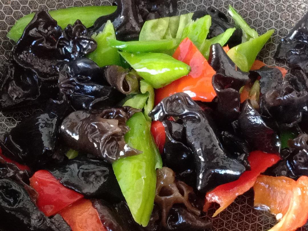 Add the peppers and cook until just done, the