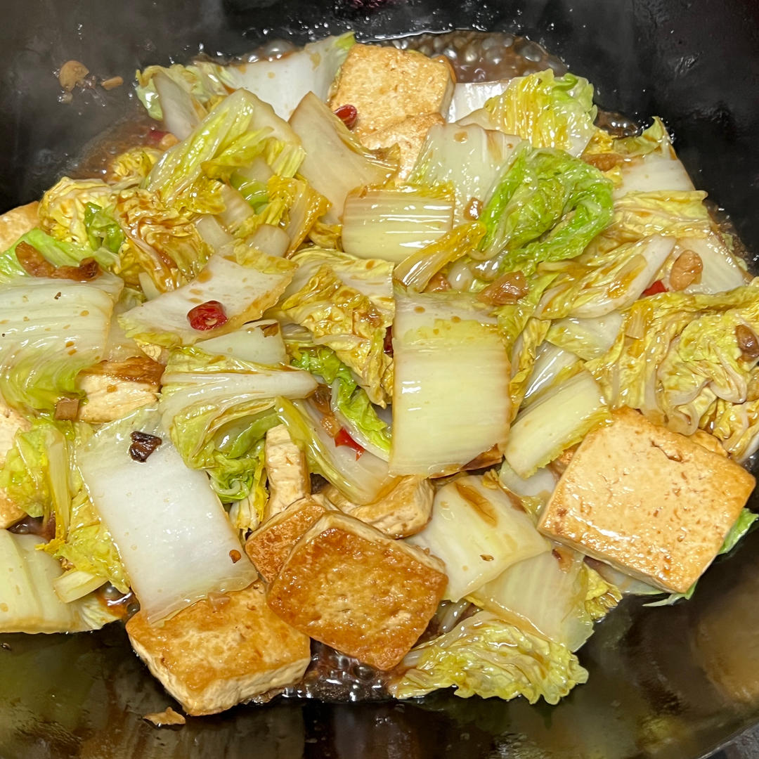 Golden tofu braised with baby cabbage in a soy glaze