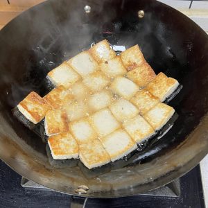 Pan-fry the tofu golden on both sides