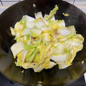 Return the tofu to the pan