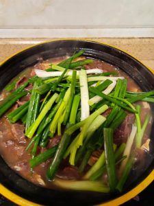 Add the scallion segments