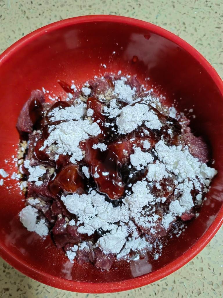 Now the beef: add a small spoon of black pepp