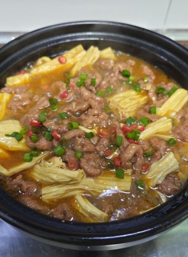 Sha-cha beef over tomato and yuba in a clay pot