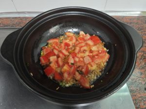 Add the tomato chunks and stir-fry 3 minutes
