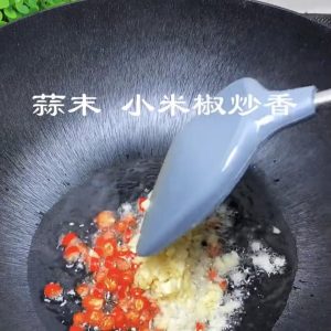 Bloom the garlic and bird's-eye chili until f