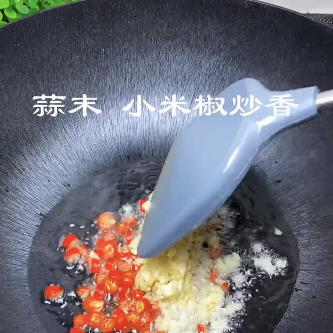 Bloom the garlic and bird's-eye chili until f