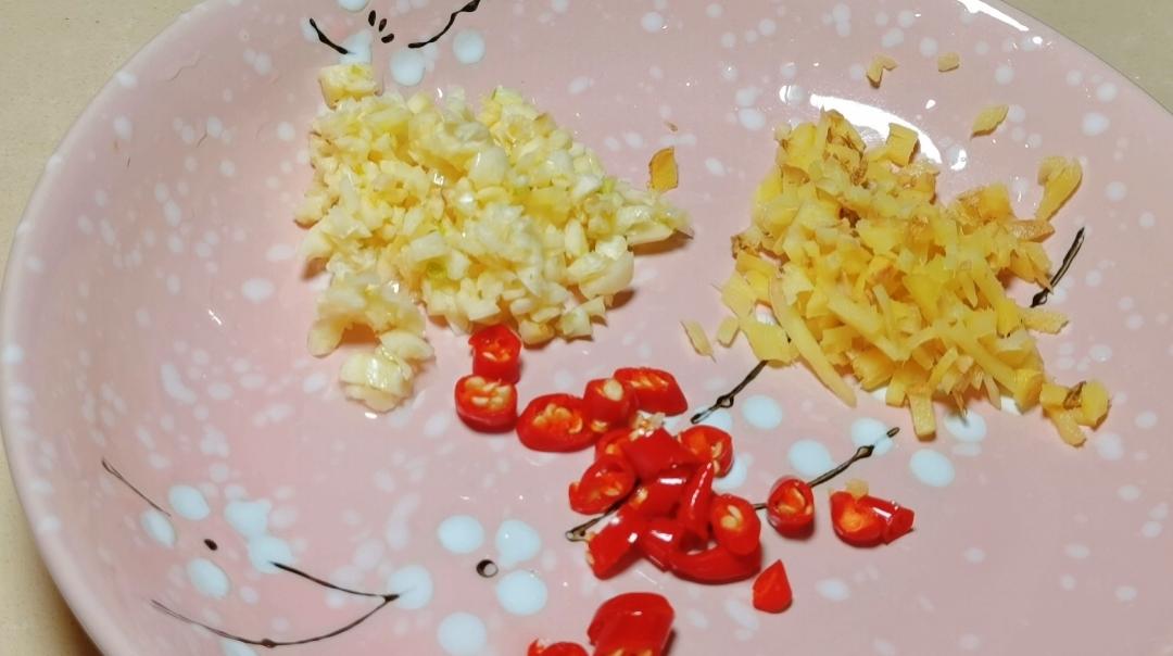 Prep the ginger, garlic, and bird's-eye chili