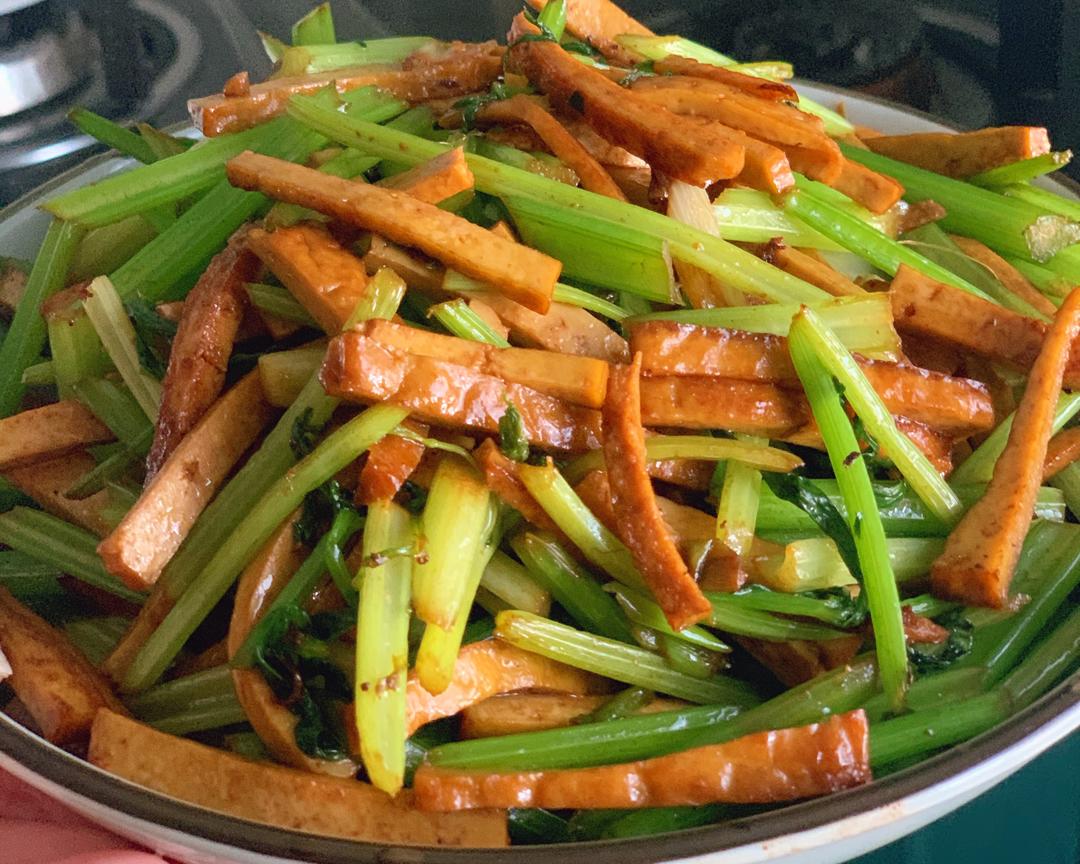 Blanched celery tossed with smoked tofu threads