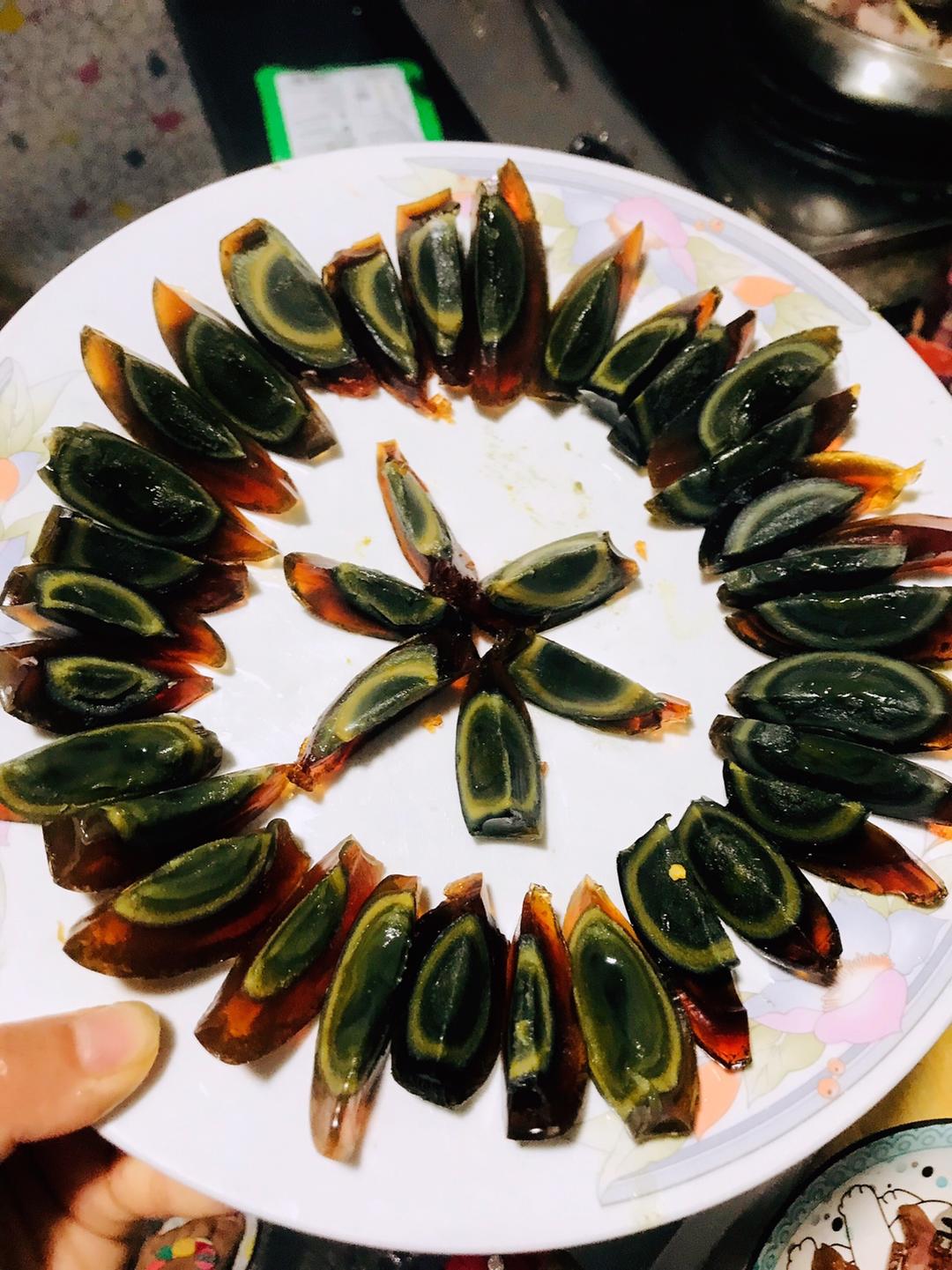 Peel and slice the chilled century eggs