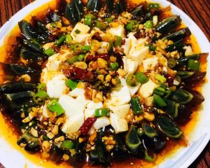 Pour the dressing over the salad and serve