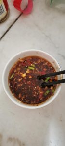 Stir the dressing, add the light soy and sesa