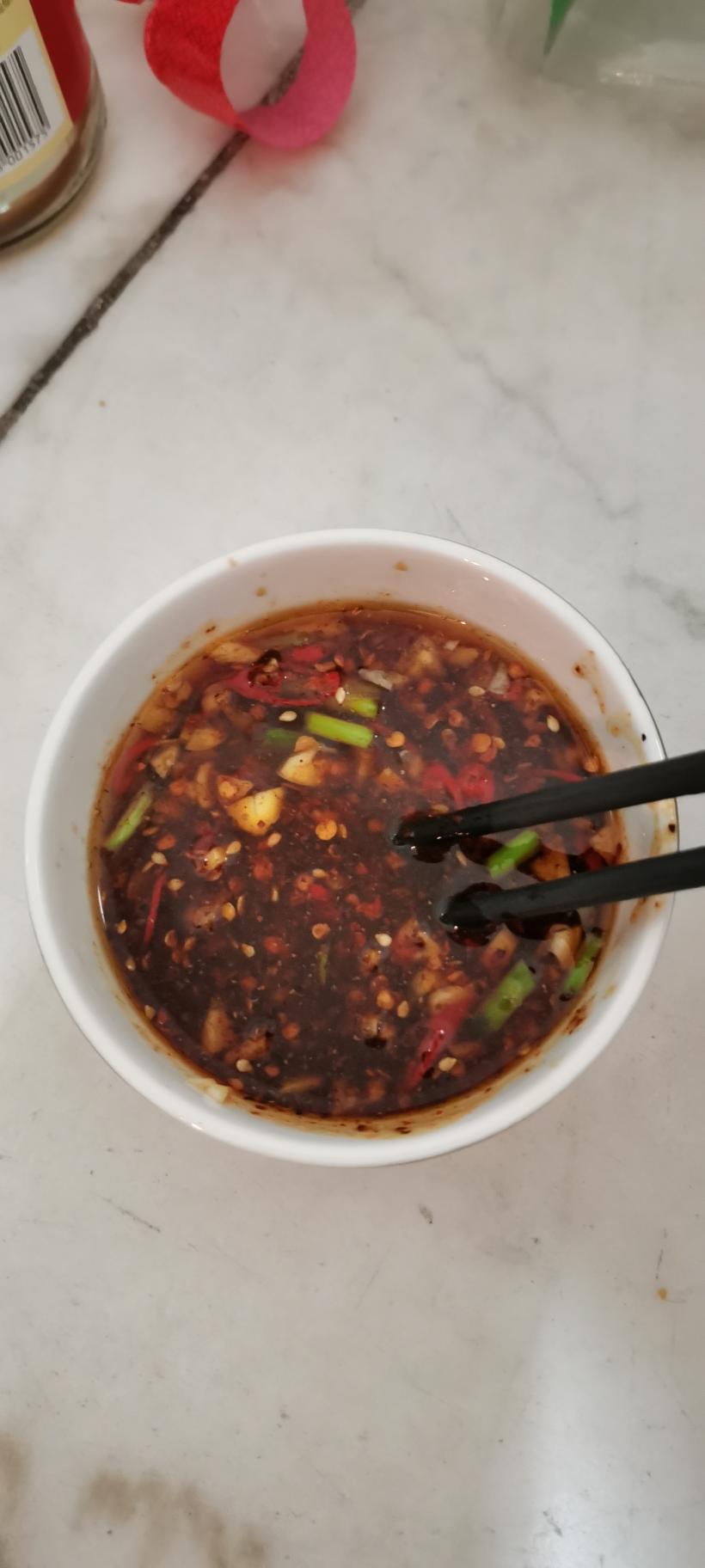 Stir the dressing, add the light soy and sesa
