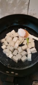 Blanch the tofu in salted water 2 minutes - g