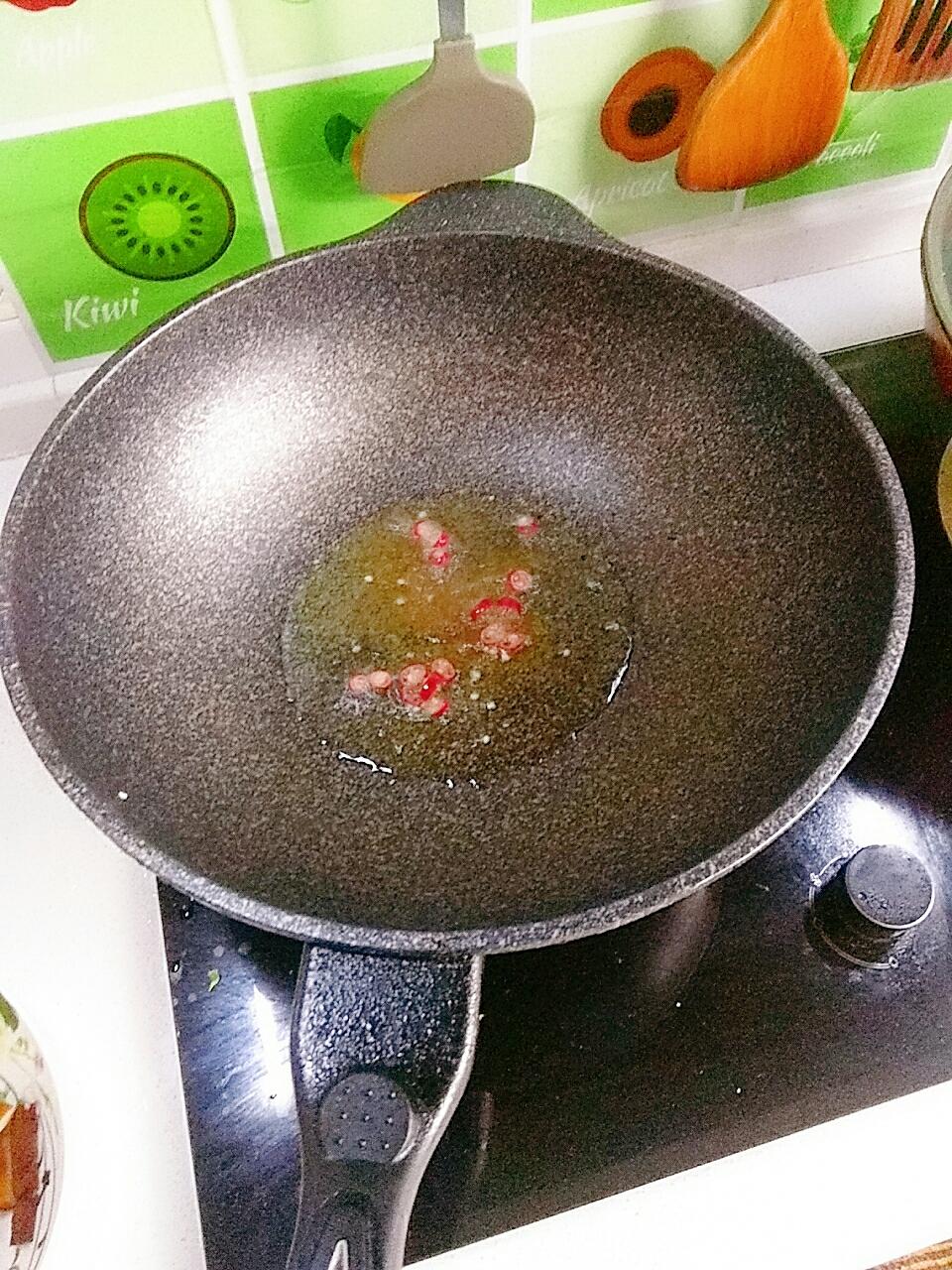 Heat oil to about six-tenths hot and bloom th