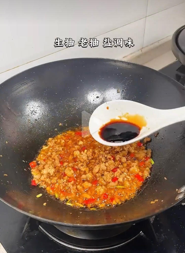 Season with light soy, dark soy, and salt