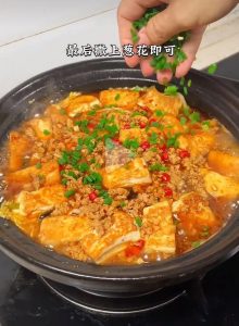 Scatter scallion and serve