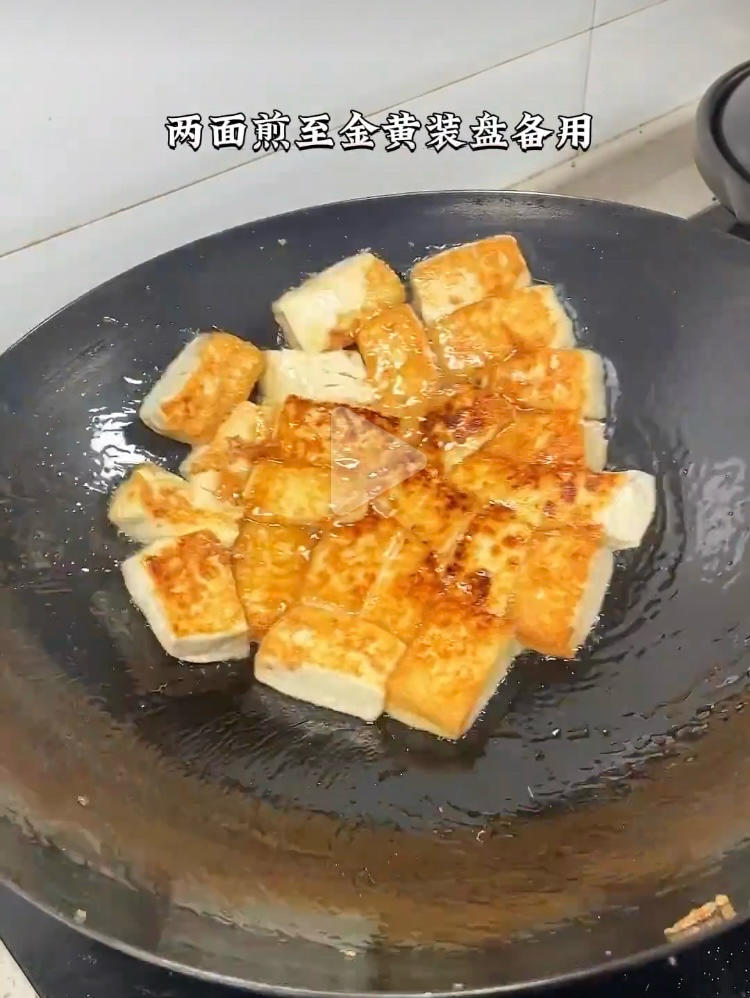 When both sides are golden, plate the tofu an
