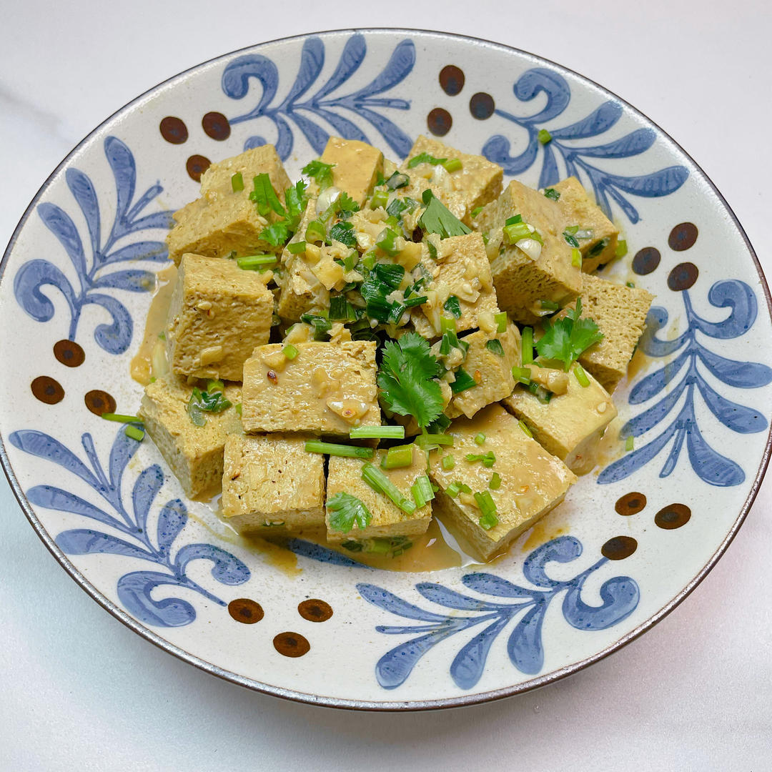 Pour the sauce over the tofu and toss