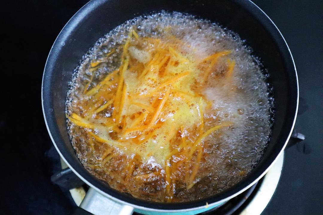 Blanch the carrot shreds until just cooked