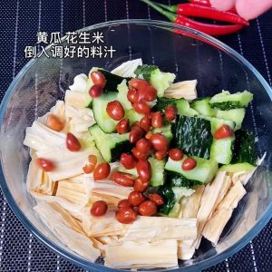 Add the pre-boiled yuba to a bowl with cucumb