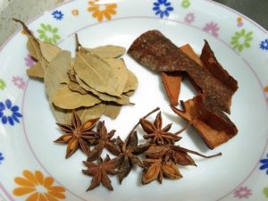 Get the star anise, bay leaves, and cinnamon