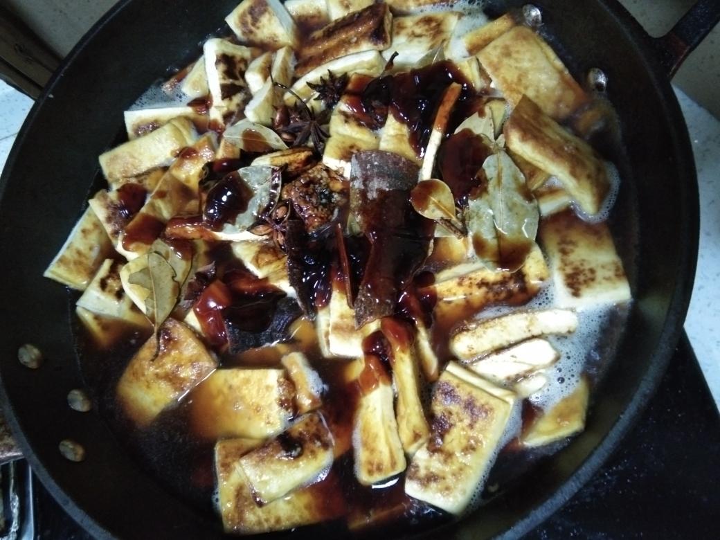 Add water to nearly cover the tofu, then ligh