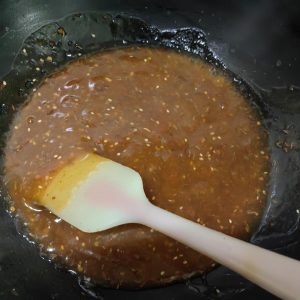 Drizzle in the starch water and add sesame an