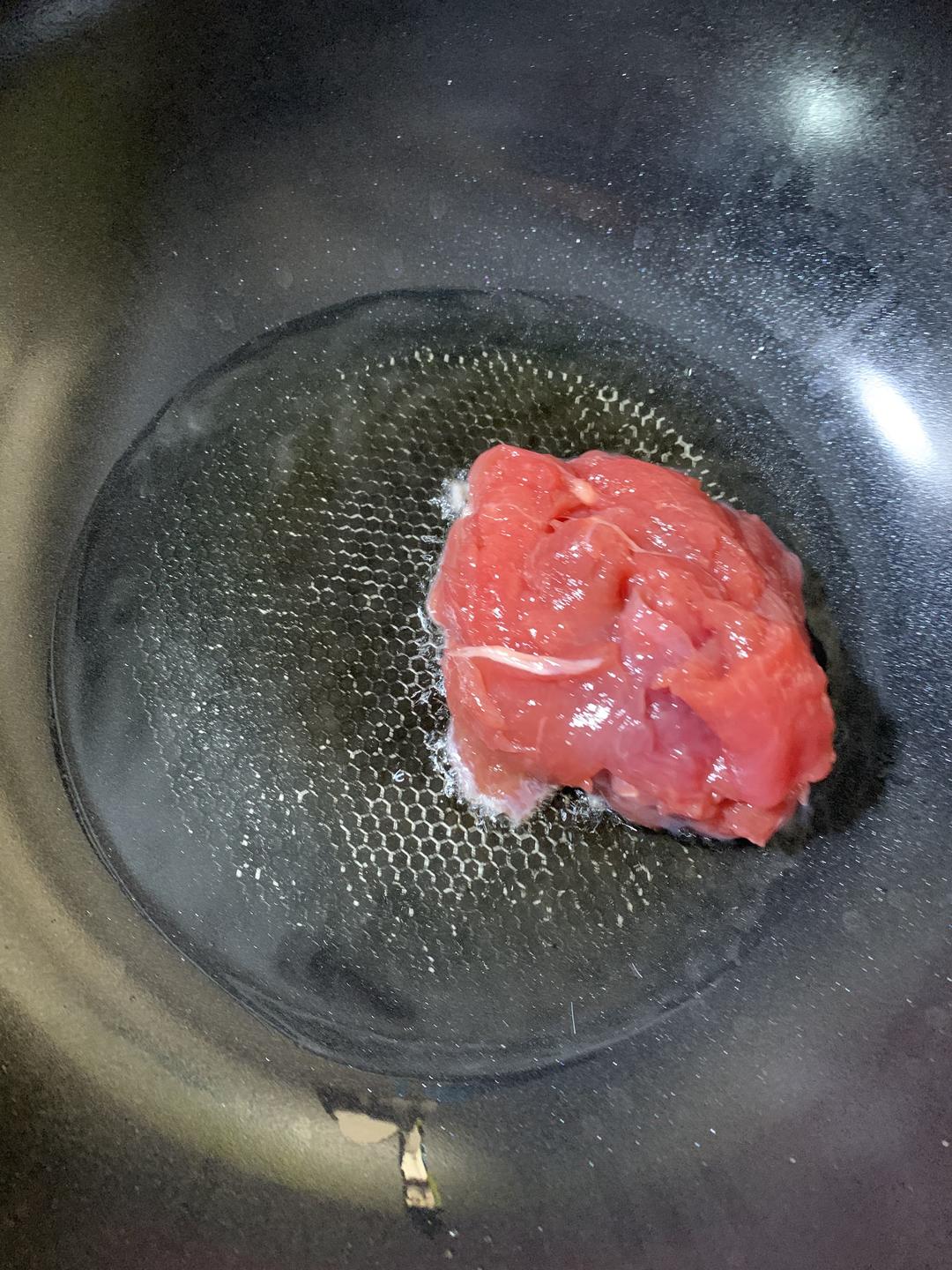 Heat oil and flash-fry the marinated pork