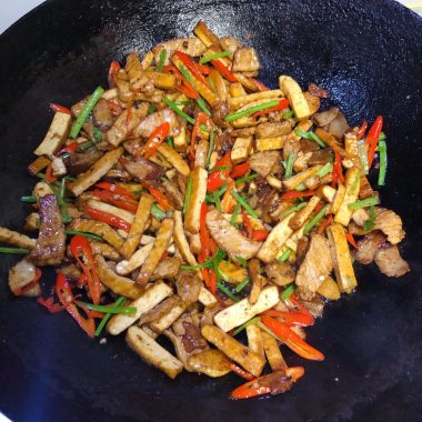 Dark soy pork with xiang-gan, celery, and red pepper