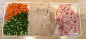 Prep the ingredients and slice the qianye tofu thin