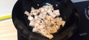 Render the pork belly until curling
