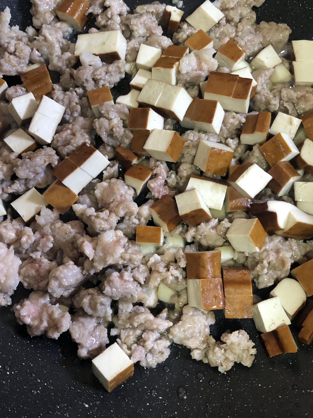 Add the xiang-gan and cook until fragrant