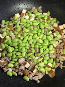 Add the green beans and toss until fragrant