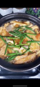 Scatter scallion segments at the end