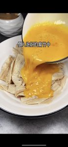 Pour the eggs over the soaked yuba