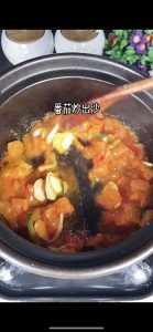 Add the tomato and cook until it turns to sau