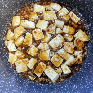 Simmer the sauce until glossy