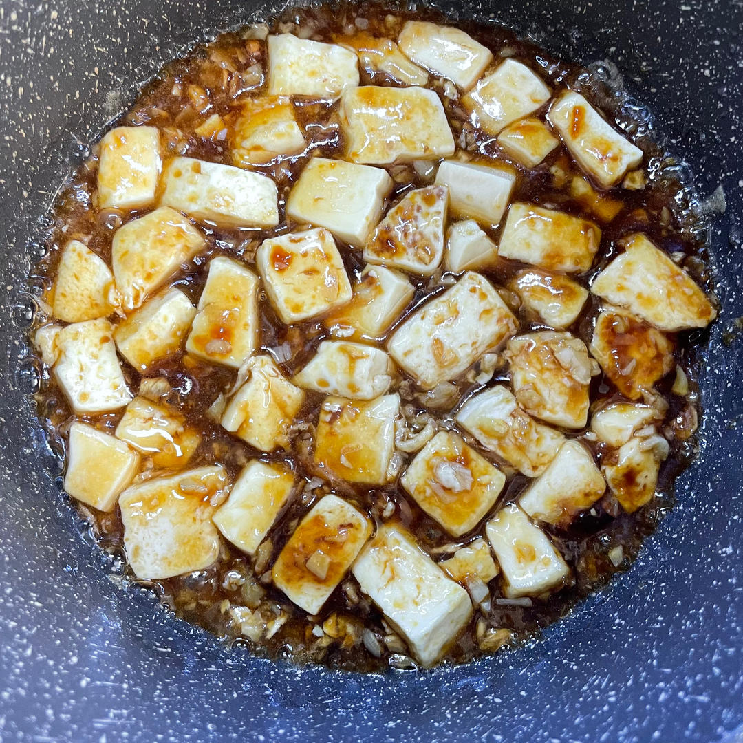 Simmer the sauce until glossy