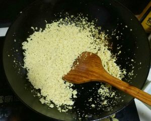 Heat a little oil and fry the chopped tofu un