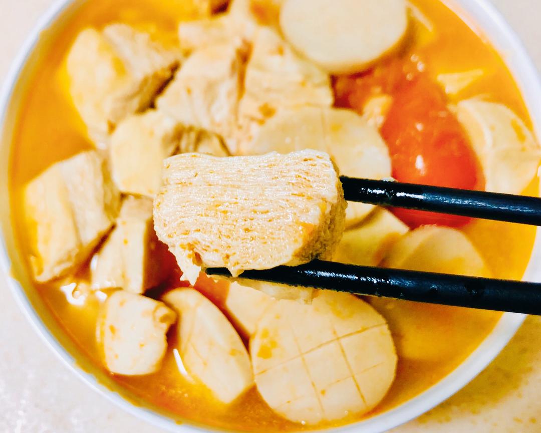 Bite a cube that has drunk all the broth - it